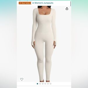 Bodysuit in beige/cream. Size Small.